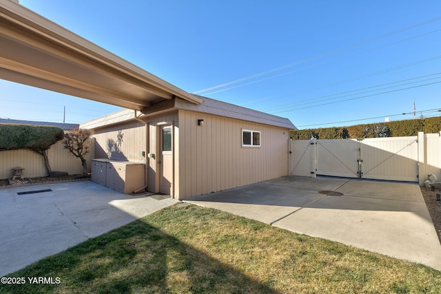 exterior space with a gate and fence