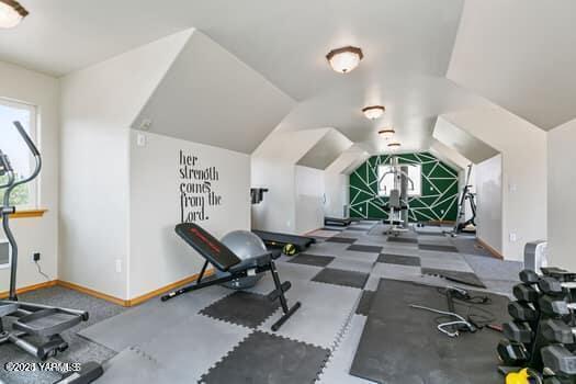 921 Tibbling Rd, Selah, WA 98942 - exercise area with vaulted ceiling, baseboards, and carpet