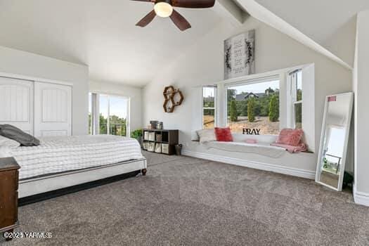 921 Tibbling Rd, Selah, WA 98942 - bedroom with carpet, beamed ceiling, a closet, a ceiling fan, and high vaulted ceiling