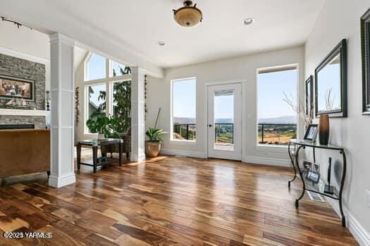 921 Tibbling Rd, Selah, WA 98942 - living area with wood finished floors and healthy amount of natural light