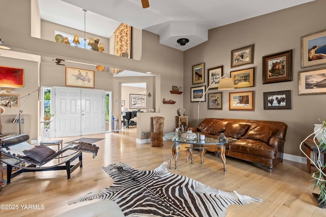 131 Katie Ln, Selah, WA 98942 - living area with baseboards, wood finished floors, and a high ceiling