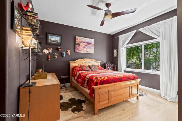 131 Katie Ln, Selah, WA 98942 - bedroom featuring light wood-type flooring, baseboards, and ceiling fan