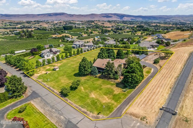 131 Katie Ln, Selah, WA 98942 - overview of rural landscape with property boundaries highlighted, a mountain backdrop, and abundant farmland