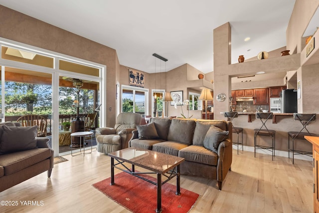 131 Katie Ln, Selah, WA 98942 - living room featuring a towering ceiling and light wood-style flooring