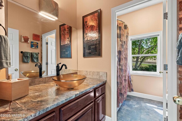 131 Katie Ln, Selah, WA 98942 - bathroom with double vanity and baseboards