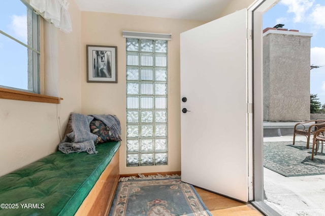 doorway to outside featuring wood finished floors