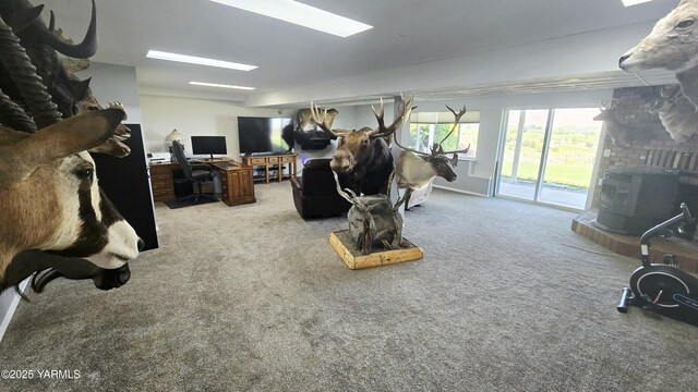 15911 Fisk Rd, Yakima, WA 98908 - living room with carpet flooring, a fireplace, and a desk
