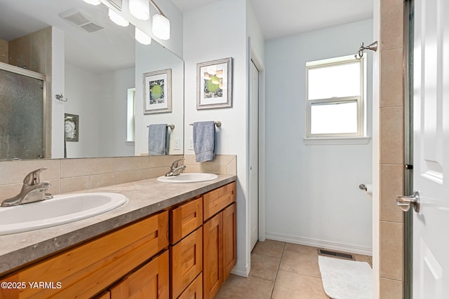 310 W Riverview Ave Unit C, Selah, WA 98942 - full bath with double vanity, tile patterned flooring, and a shower stall