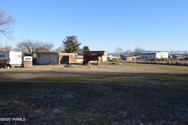 view of yard with fence