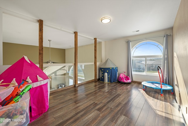 rec room featuring dark wood-style flooring and visible vents