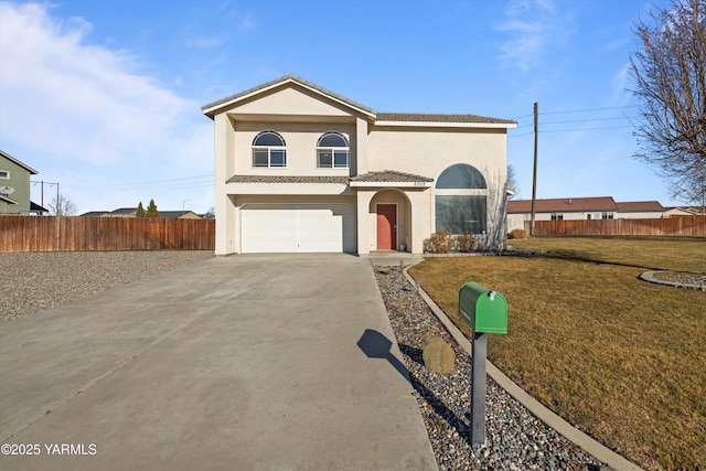 view of front of property featuring a front yard, concrete driveway, a tile roof, and fence