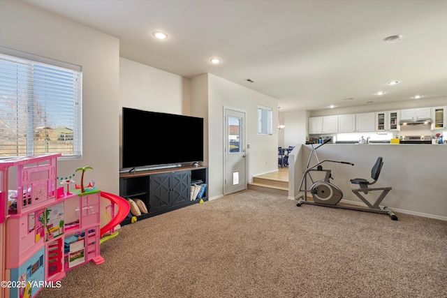 workout room with baseboards, carpet flooring, and recessed lighting