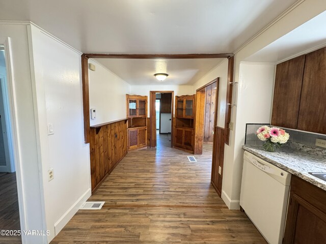 3803 Tieton Dr, Yakima, WA 98902 - hallway with wood finished floors, wainscoting, wooden walls, and baseboards