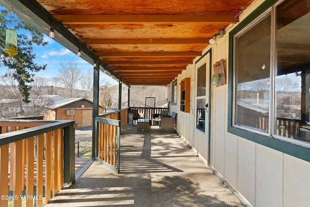 exterior space featuring an outdoor structure and a storage unit