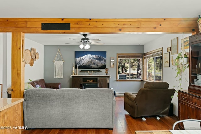 living room featuring hardwood / wood-style floors and ceiling fan