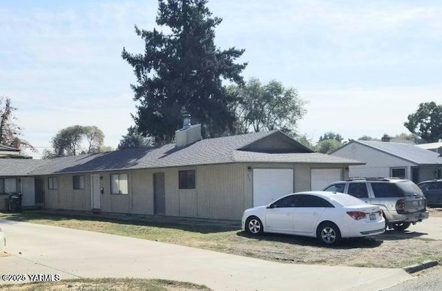 view of property exterior with a garage