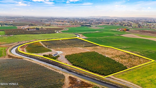 drone / aerial view featuring a rural view and a water view