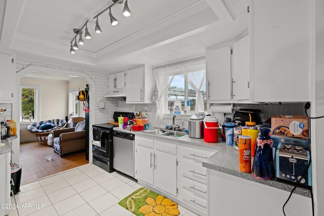 961 Lucy Ln, Zillah, WA 98953 - kitchen featuring under cabinet range hood, dishwasher, a tray ceiling, range with electric stovetop, and a sink