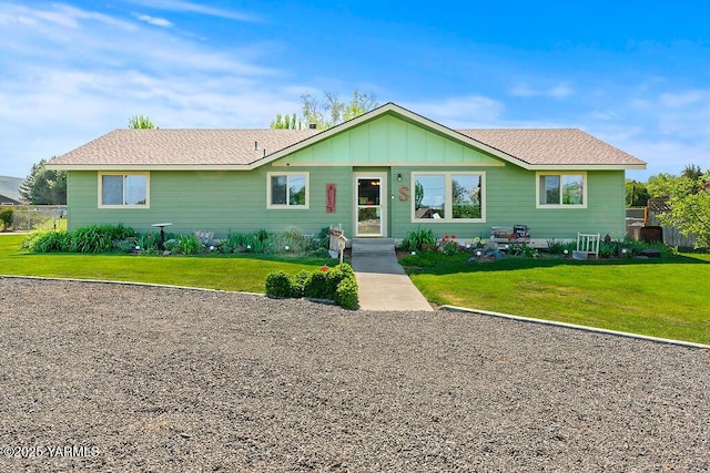2810 S 79th Ave, Yakima, WA 98903 - ranch-style home with a front lawn and board and batten siding