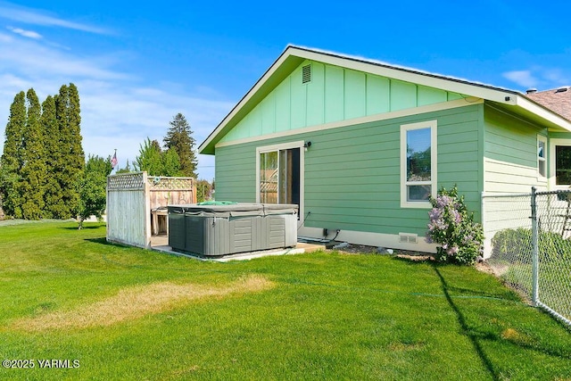 2810 S 79th Ave, Yakima, WA 98903 - back of house with a hot tub and board and batten siding
