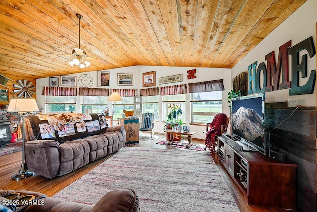 2810 S 79th Ave, Yakima, WA 98903 - living room featuring vaulted ceiling, wood finished floors, plenty of natural light, wooden ceiling, and a chandelier