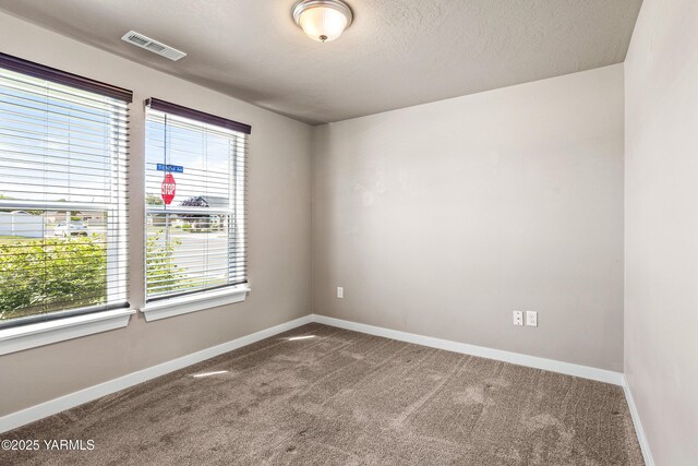 2201 S 62nd Ave, Yakima, WA 98903 - empty room with carpet and baseboards