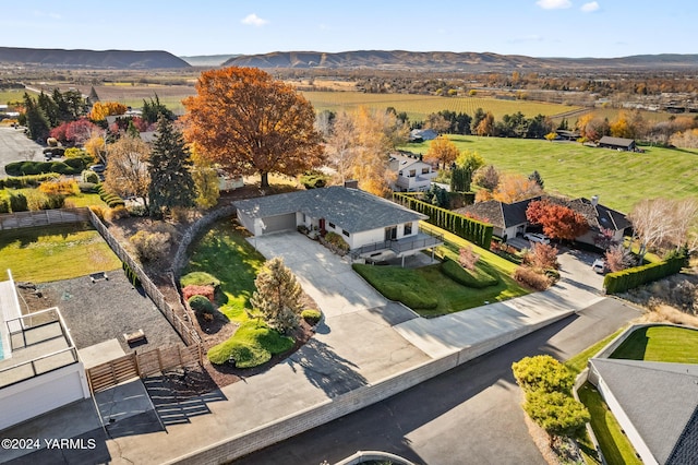 drone / aerial view featuring a mountain view