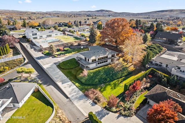 aerial view featuring a mountain view and a residential view