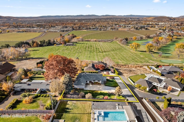 drone / aerial view with a residential view and a mountain view