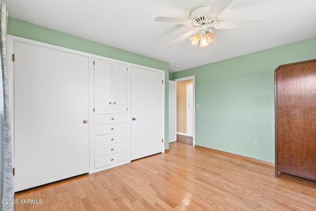 220 N 42nd Ave, Yakima, WA 98908 - unfurnished bedroom featuring a ceiling fan, baseboards, and light wood-style floors