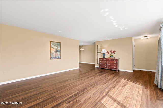 220 N 42nd Ave, Yakima, WA 98908 - unfurnished room with baseboards and wood finished floors