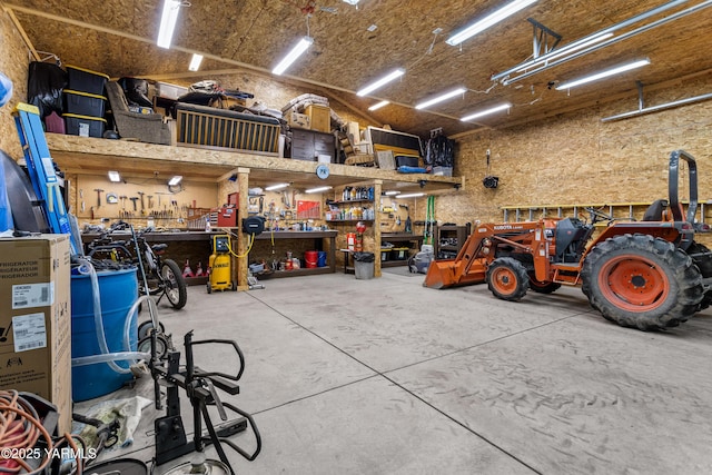 garage featuring a workshop area