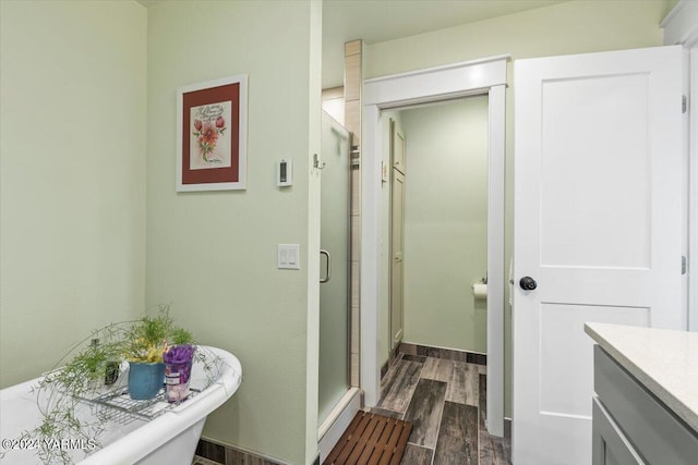 31 Gilbert Rd, Zillah, WA 98953 - full bath featuring a shower stall, wood finished floors, and vanity