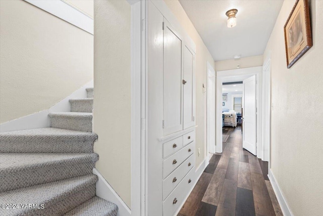 31 Gilbert Rd, Zillah, WA 98953 - corridor with stairs and dark wood-style flooring