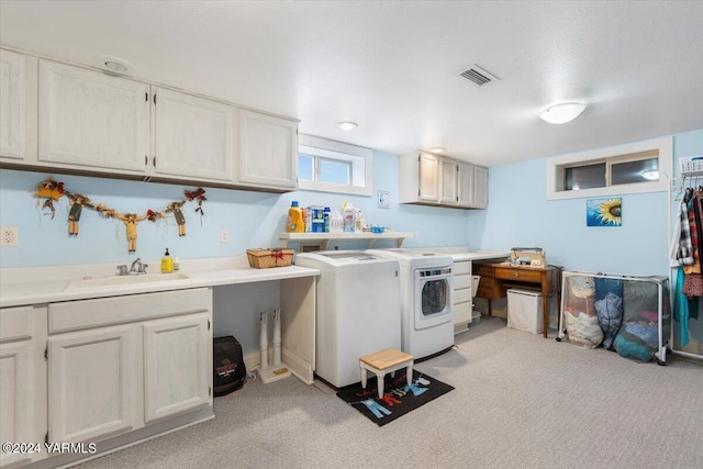 31 Gilbert Rd, Zillah, WA 98953 - laundry room featuring cabinet space, independent washer and dryer, and light carpet