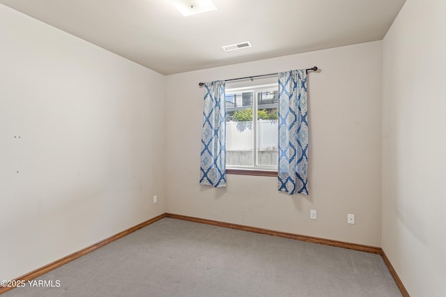7511 Maclaren St, Yakima, WA 98908 - spare room featuring light colored carpet and baseboards