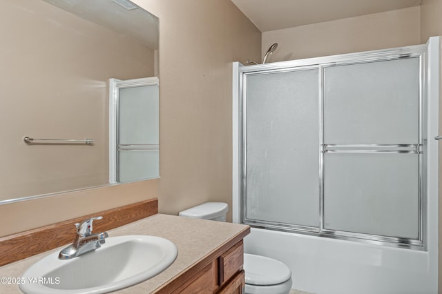 7511 Maclaren St, Yakima, WA 98908 - full bath featuring toilet, vanity, and combined bath / shower with glass door