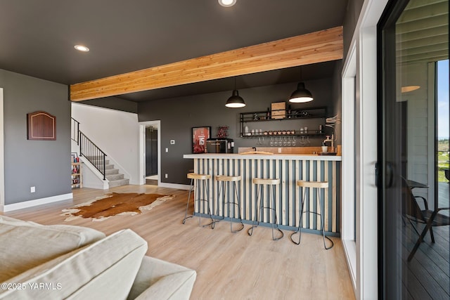 4611 Hilltop Way, Yakima, WA 98908 - indoor wet bar featuring wood finished floors, stairs, baseboards, recessed lighting, and beam ceiling