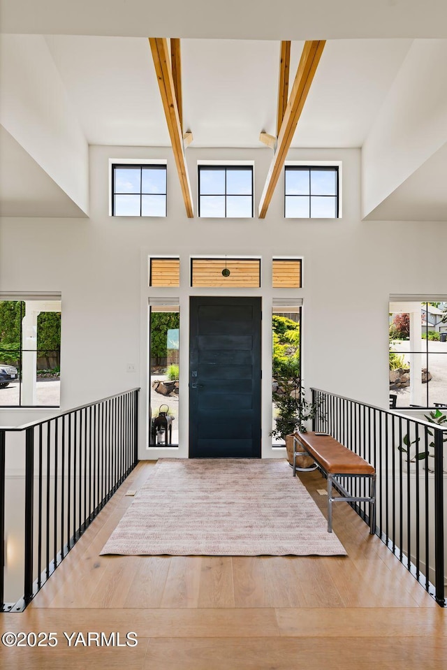 4611 Hilltop Way, Yakima, WA 98908 - entrance foyer featuring wood-type flooring, healthy amount of natural light, beam ceiling, and a towering ceiling