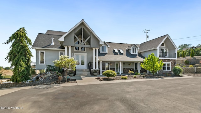 921 Tibbling Rd, Selah, WA 98942 - view of front of house with covered porch, stone siding, and a shingled roof