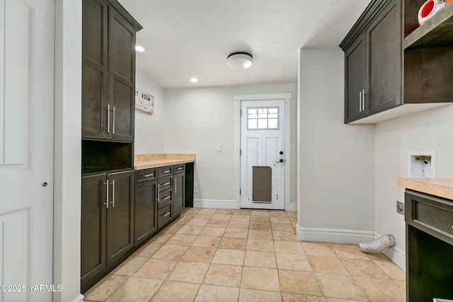 921 Tibbling Rd, Selah, WA 98942 - washroom with electric dryer hookup, cabinet space, recessed lighting, and washer hookup