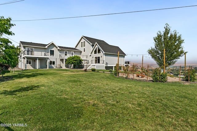 921 Tibbling Rd, Selah, WA 98942 - rear view of property with a lawn and a wooden deck