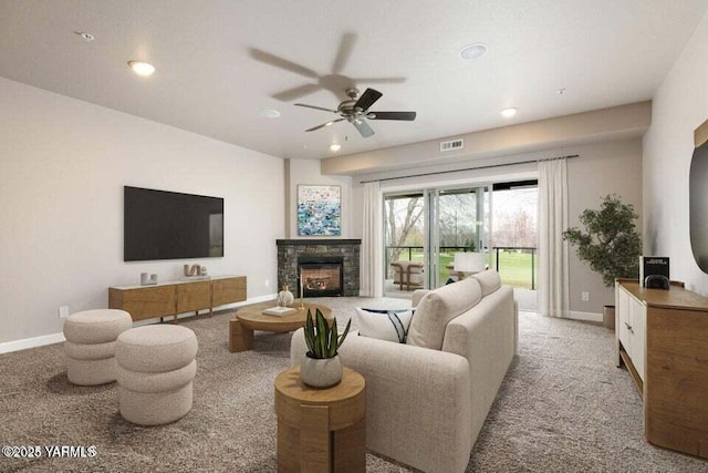 8905 Occidental Rd Unit 202A, Yakima, WA 98903 - living area with ceiling fan, recessed lighting, baseboards, light carpet, and a stone fireplace