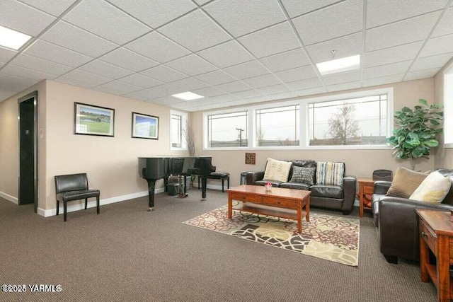 8905 Occidental Rd Unit 202A, Yakima, WA 98903 - carpeted living area featuring a drop ceiling, plenty of natural light, and baseboards