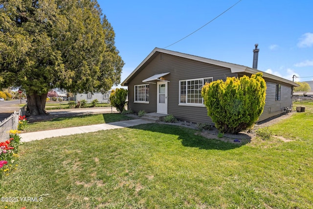 bungalow with a front yard