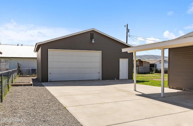 detached garage with fence