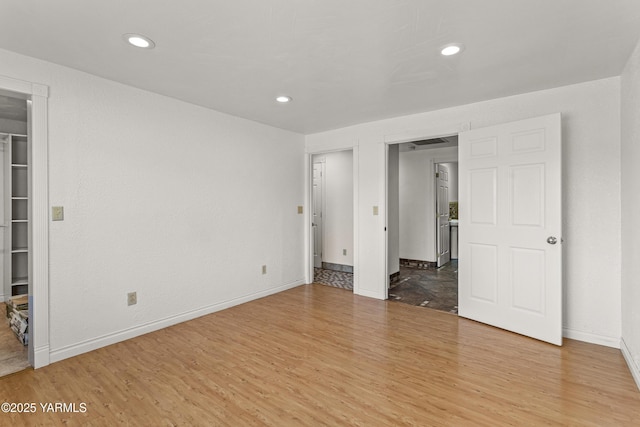 5252 US Highway 12, Yakima, WA 98908 - unfurnished bedroom featuring light wood-style flooring and recessed lighting