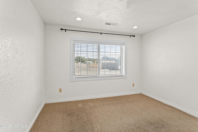 5252 US Highway 12, Yakima, WA 98908 - unfurnished room with carpet, recessed lighting, and a textured wall
