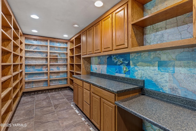 5252 US Highway 12, Yakima, WA 98908 - kitchen featuring open shelves, recessed lighting, dark countertops, tasteful backsplash, and brown cabinets
