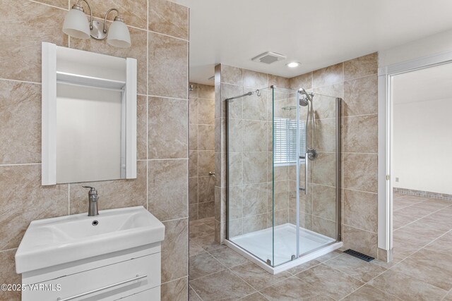 5252 US Highway 12, Yakima, WA 98908 - full bathroom with a shower stall, vanity, and tile walls